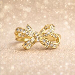 Elegant Gold Bow Ring with Crystals
